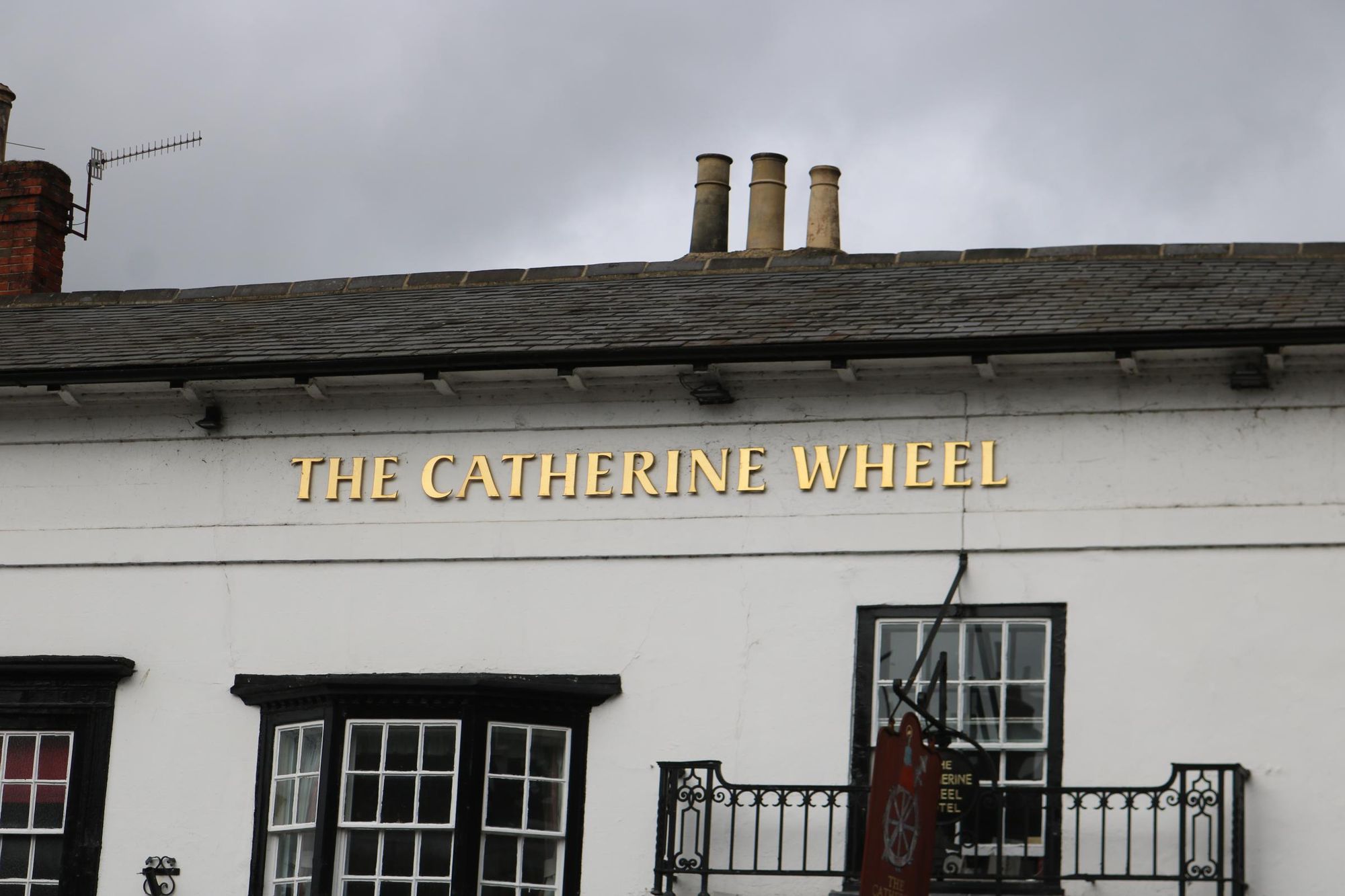 HoT - Catherine Wheel - pub name on western block Feb 2026. (External, Sign). Published on 08-04-2026