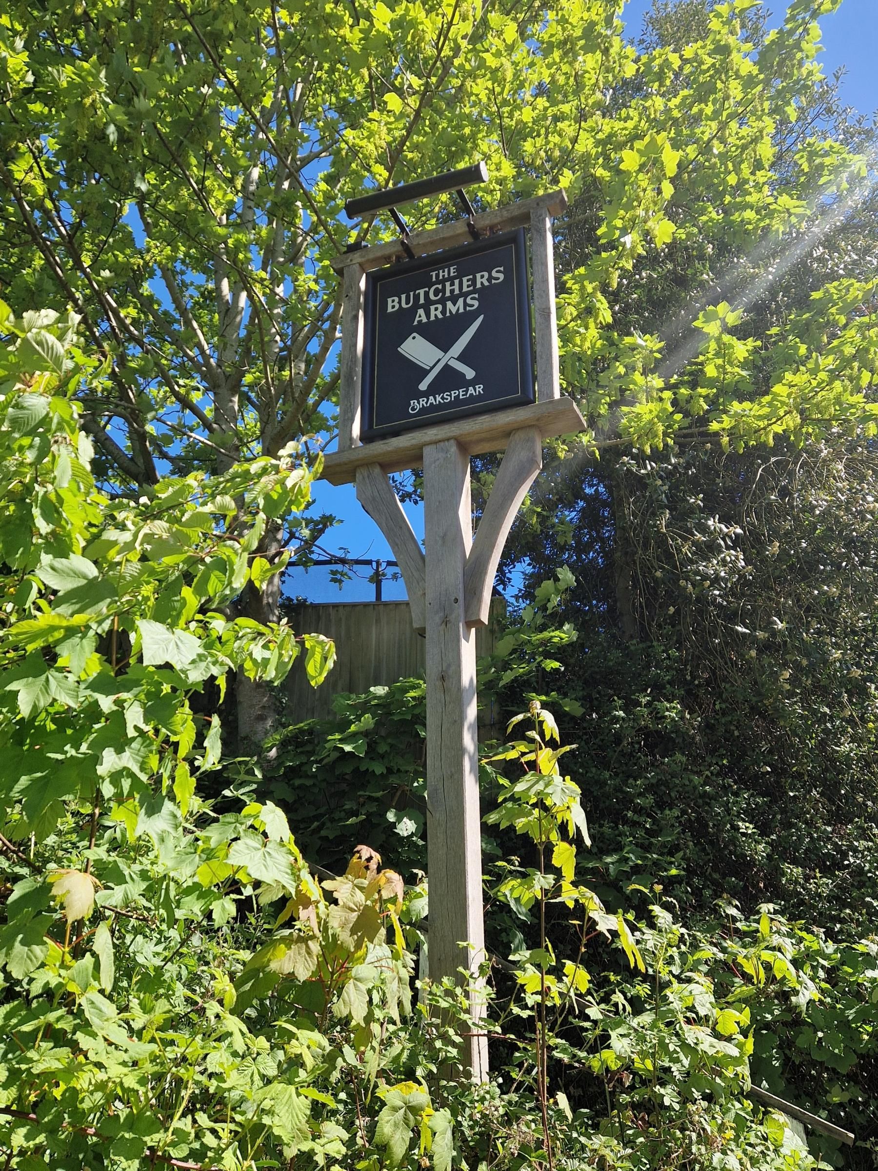 Butcher's Arms SC - Pub sign by garden gate - Apr 2026. (Sign). Published on 15-05-2026
