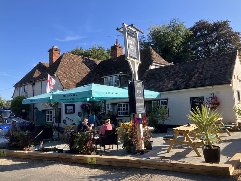 New Inn, Kidmore End - raised decking area at front of pub - Jul. (Pub, External, Key). Published on 09-08-2026
