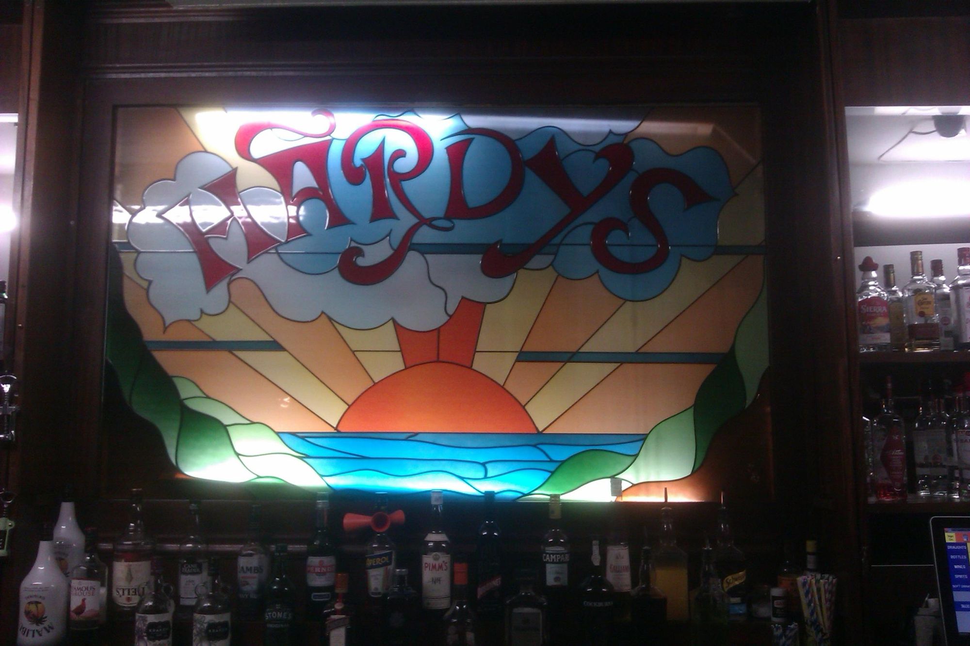 The illuminated bar back. (Pub, Bar, Sign). Published on 10-06-2024