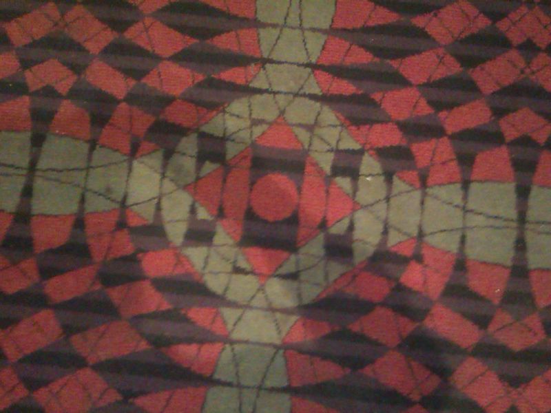 The pub's unique Wetherspoon carpet pattern. (Bar). Published on 09-10-2023 