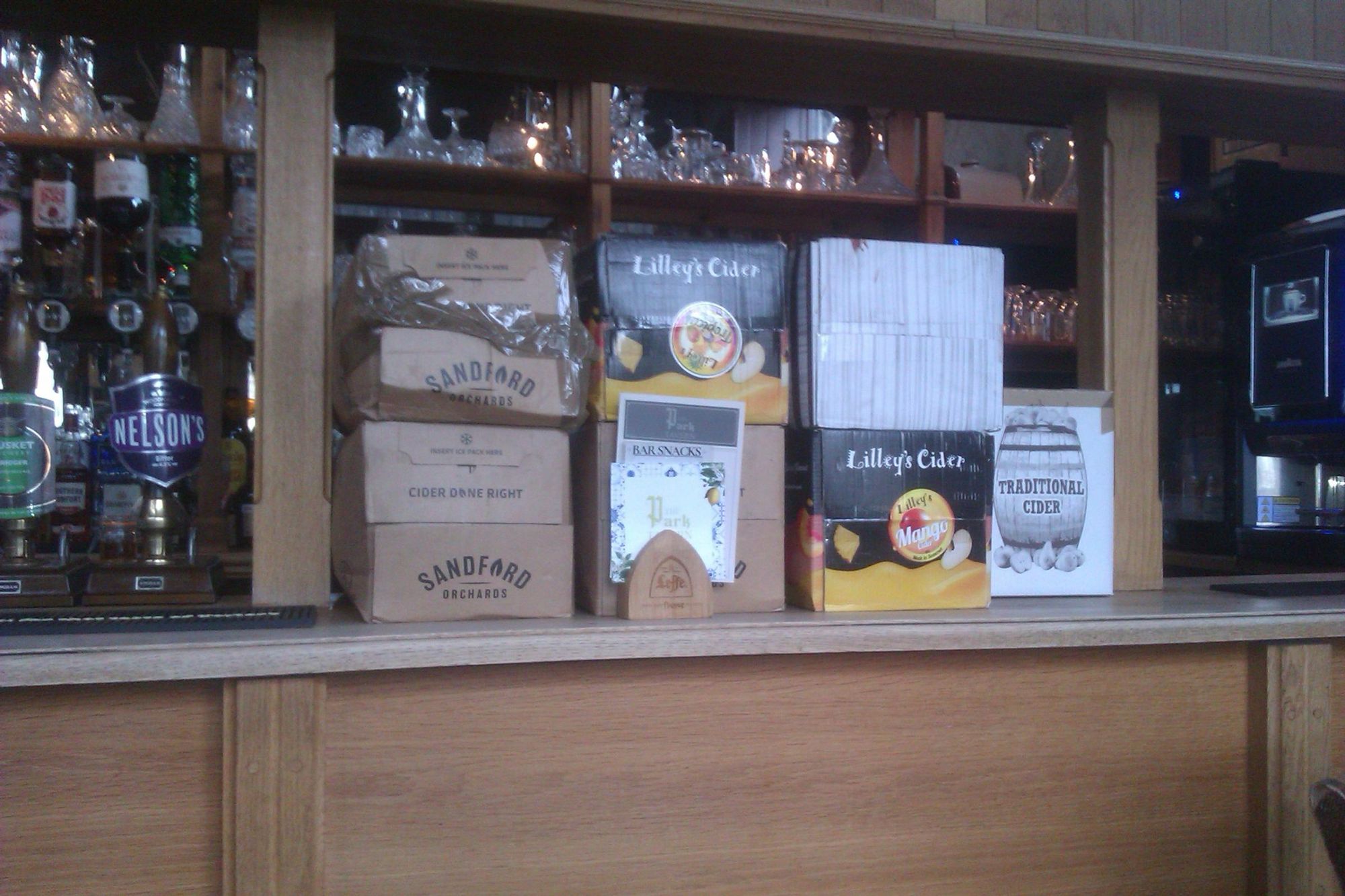 Bar counter with cider boxes - not all are real cider. (Bar). Published on 28-09-2023