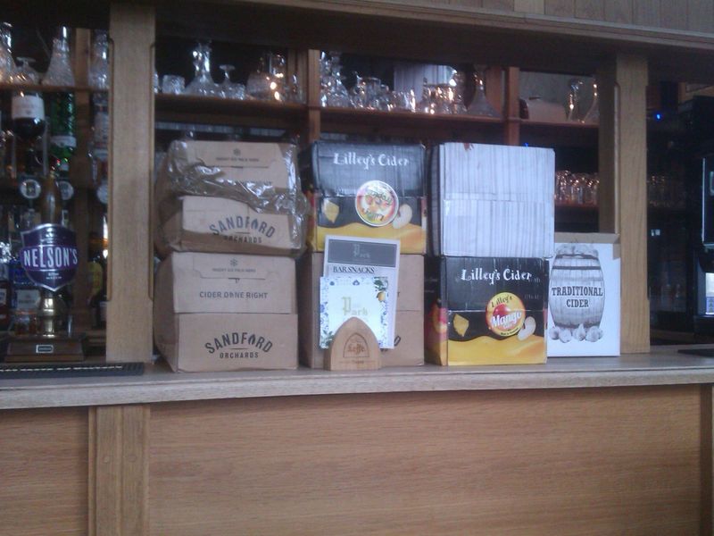 Bar counter with cider boxes - not all are real cider. (Bar). Published on 28-09-2023