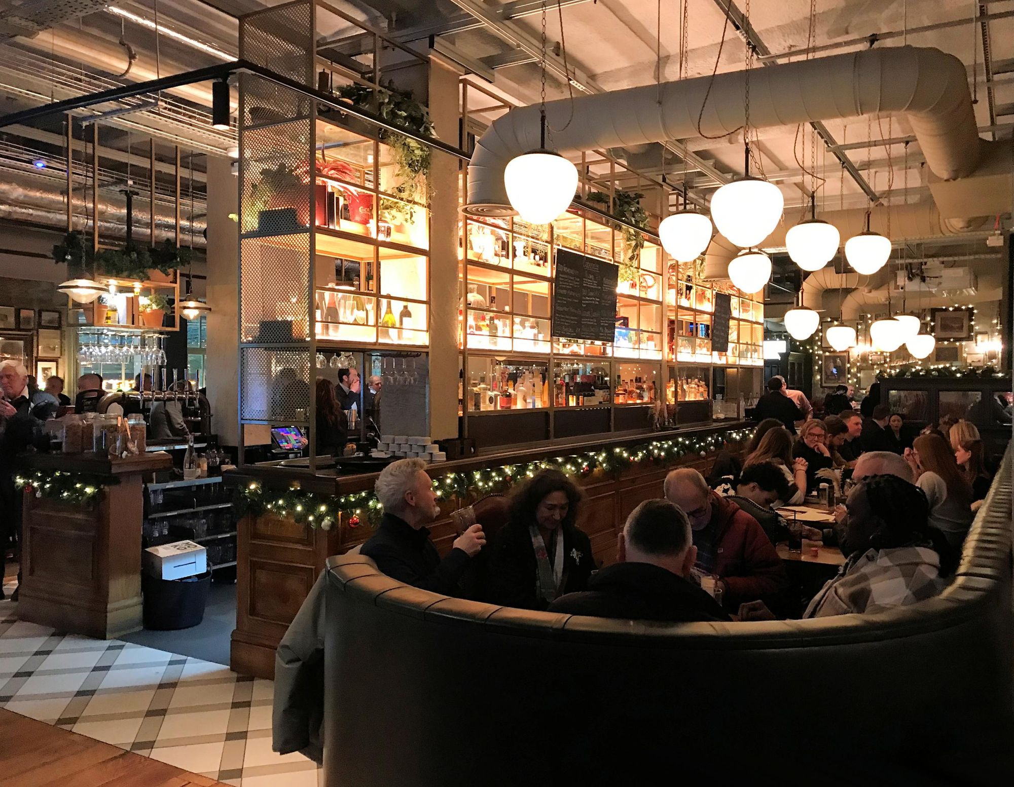 Interior of the pub behind the bar area, 2026. (Pub, Bar, Customers). Published on 30-04-2026