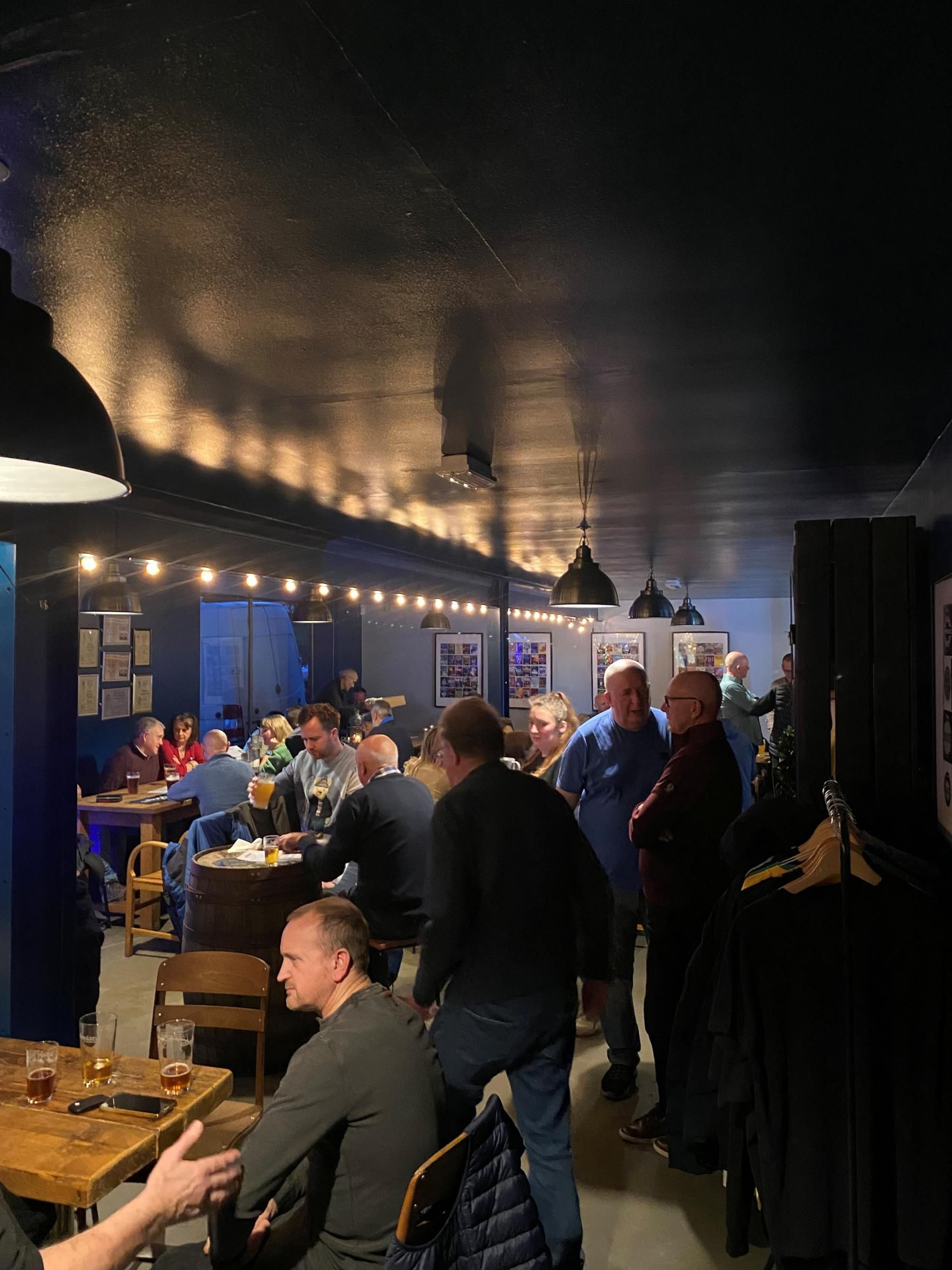 Seating and standing at Salopian Tap House. Published on 27-02-2025