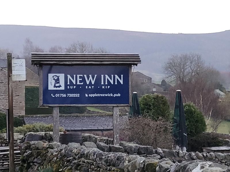 New Inn, Appletreewick - pub sign at the bus stop - March 2025. (Sign). Published on 23-03-2025