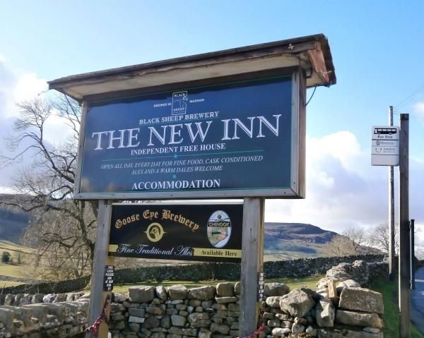 New Inn, Appletreewick - pub signage at the bus stop. (Pub, External, Sign). Published on 24-02-2015
