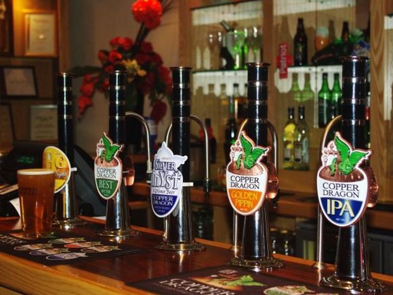 Copper Dragon Bistro, Snaygill, Skipton: pumps on the bar. (Pub, Bar). Published on 23-01-2015