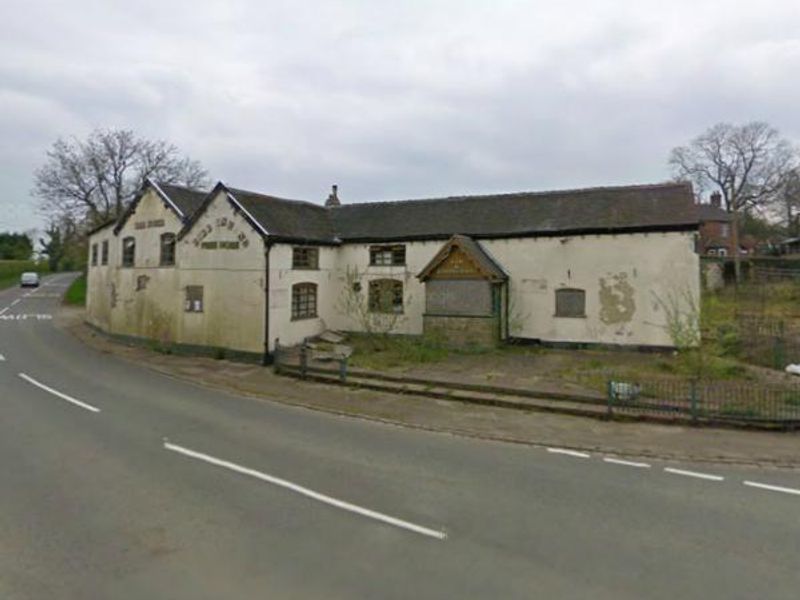 The boarded up pub in 2009. (Pub, External). Published on 13-08-2014