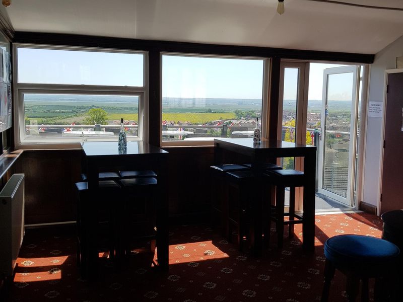 Bar with picture window view. (Bar). Published on 27-06-2025 