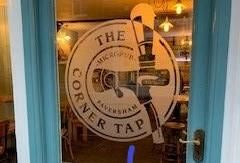 Former pub logo as The Corner Tap. (Sign). Published on 03-12-2022