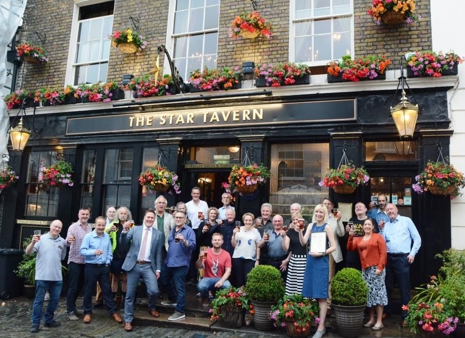 Toasting Pub of the Year 2017 in the rain!. (External, Publican, Customers). Published on 28-06-2017