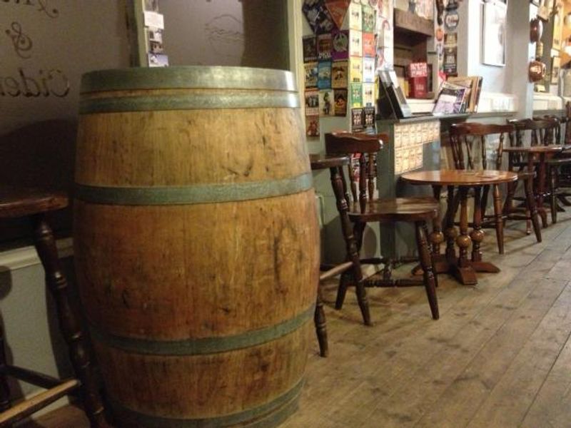 Old wine barrel used as a table. (Pub). Published on 13-09-2013