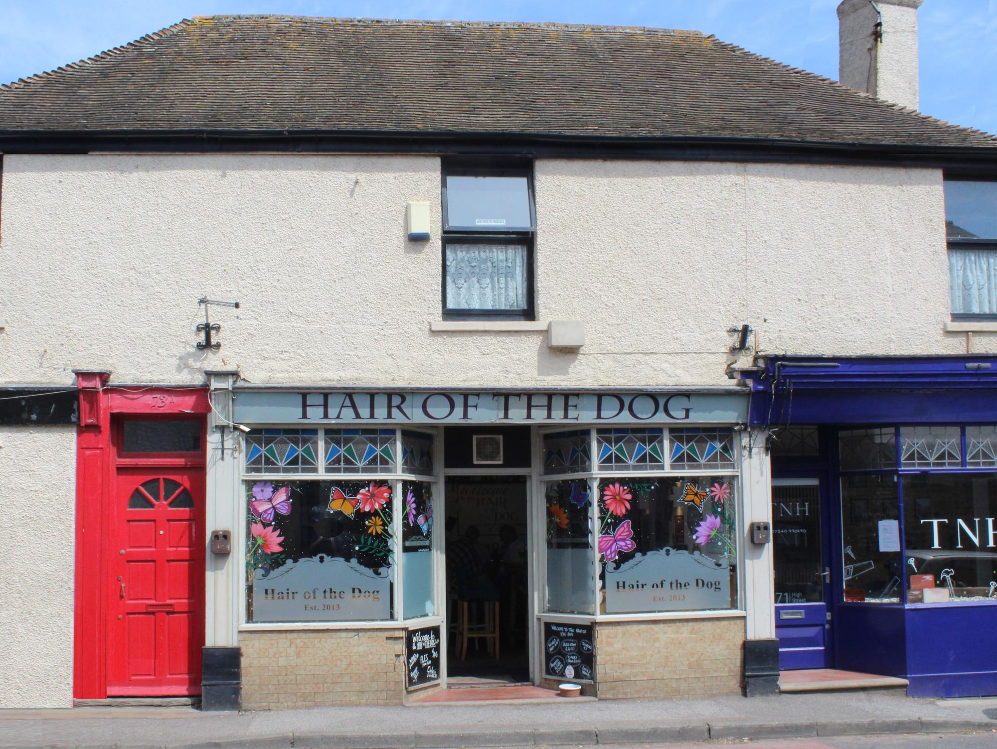 The pub windows decorated for summer 2026. (Pub, External, Key). Published on 10-05-2026