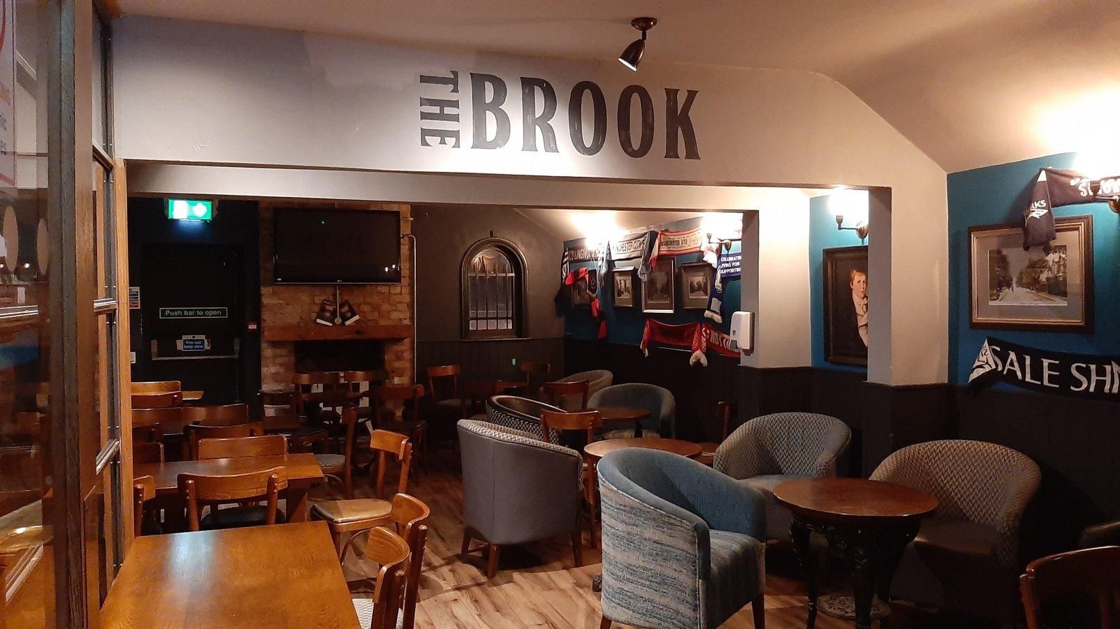 Upstairs at the Brook - sporting pictures dominate on the right . (Pub). Published on 05-10-2025