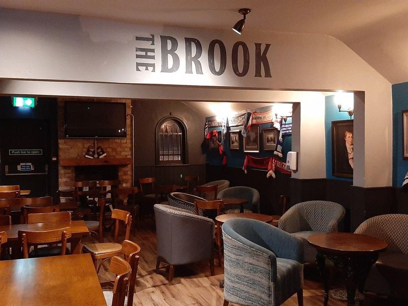 Upstairs at the Brook - sporting pictures dominate on the right . (Pub). Published on 05-10-2025 