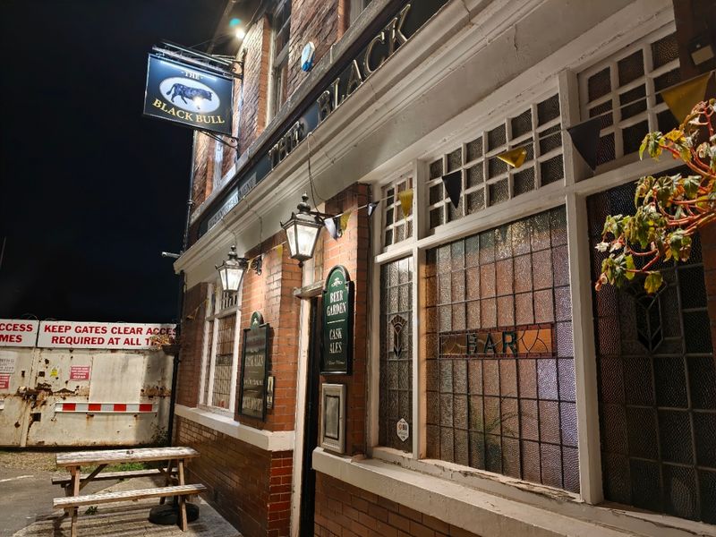Black Bull at night. (Pub, External, Sign). Published on 14-10-2026